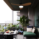 Balcony with outdoor furniture, plants, and a cityscape view